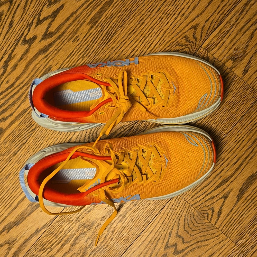 Hoka Bondi 8 size 9.5 mens, barely worn. Orange! Great condition!